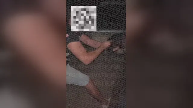 The Russian pawnbroker was taken out of a taxi and passed around in a circle